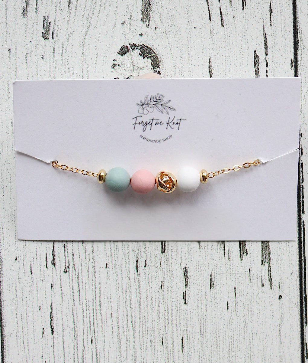 Bracelet perles d'argile chaine coulissante