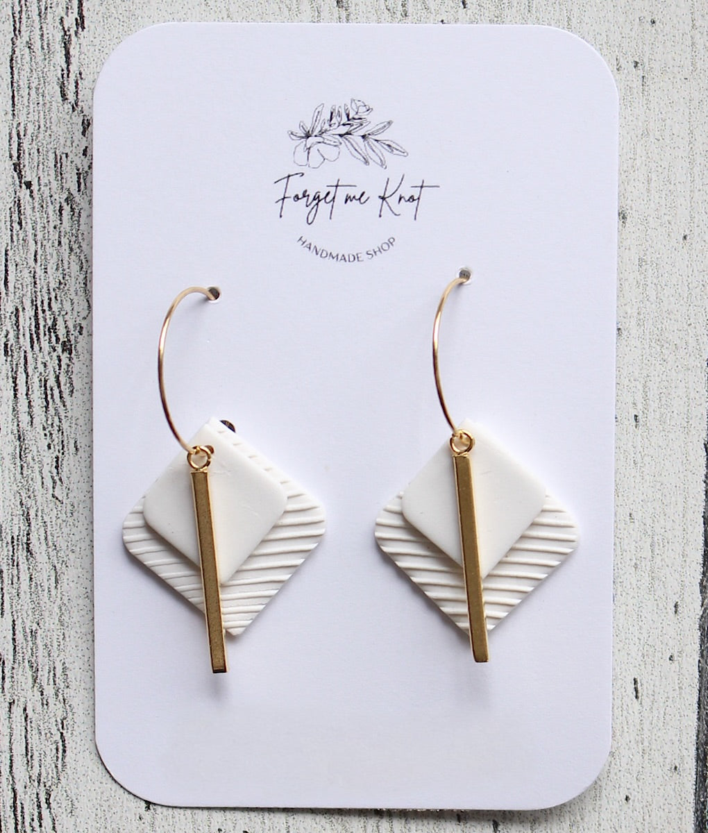 Boucles d’oreilles losanges blancs