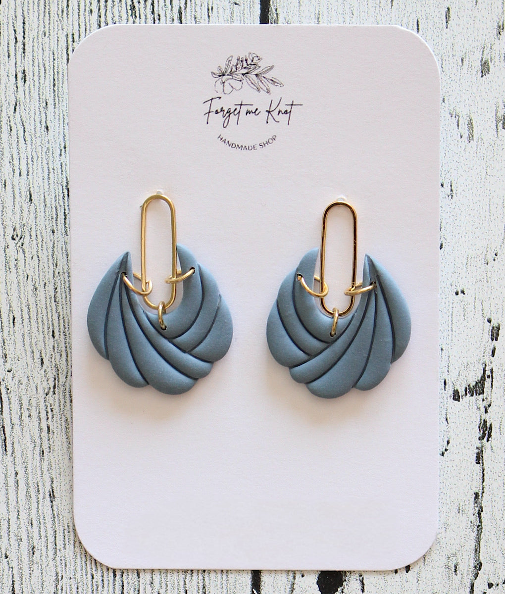 Boucles d’oreilles rondes luxueuses bleu denim